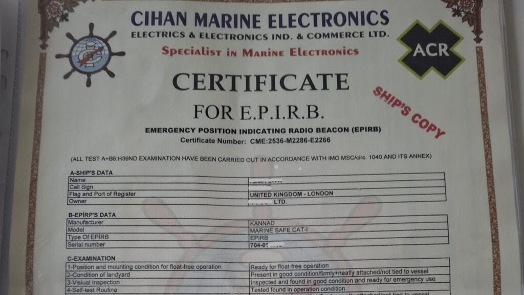 Marine survey document inspection showing vessel EPIRB safety certification